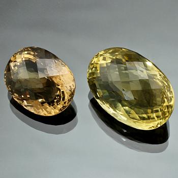 ÄDELSTENAR, 2 st, lemon quartz, 67.4 ct samt citrin, 31.55 ct, fasettslipade, 1900/2000-tal.