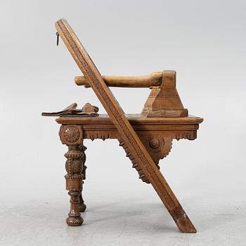 Armchair, after a design by Vasily Shutov called 'Arc, Axes and Mittens' Russia late 19th century.