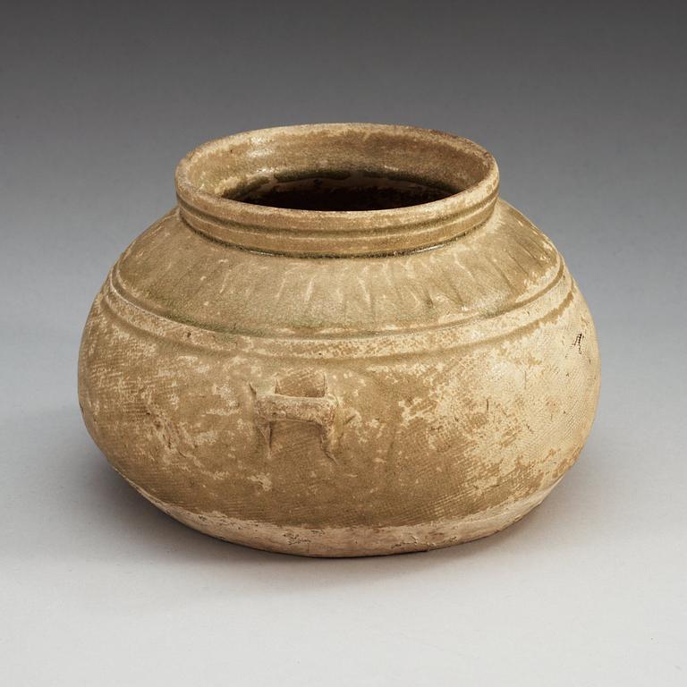 A olive green glazed jar, Western Jin Dynasty, ca 300 AD.