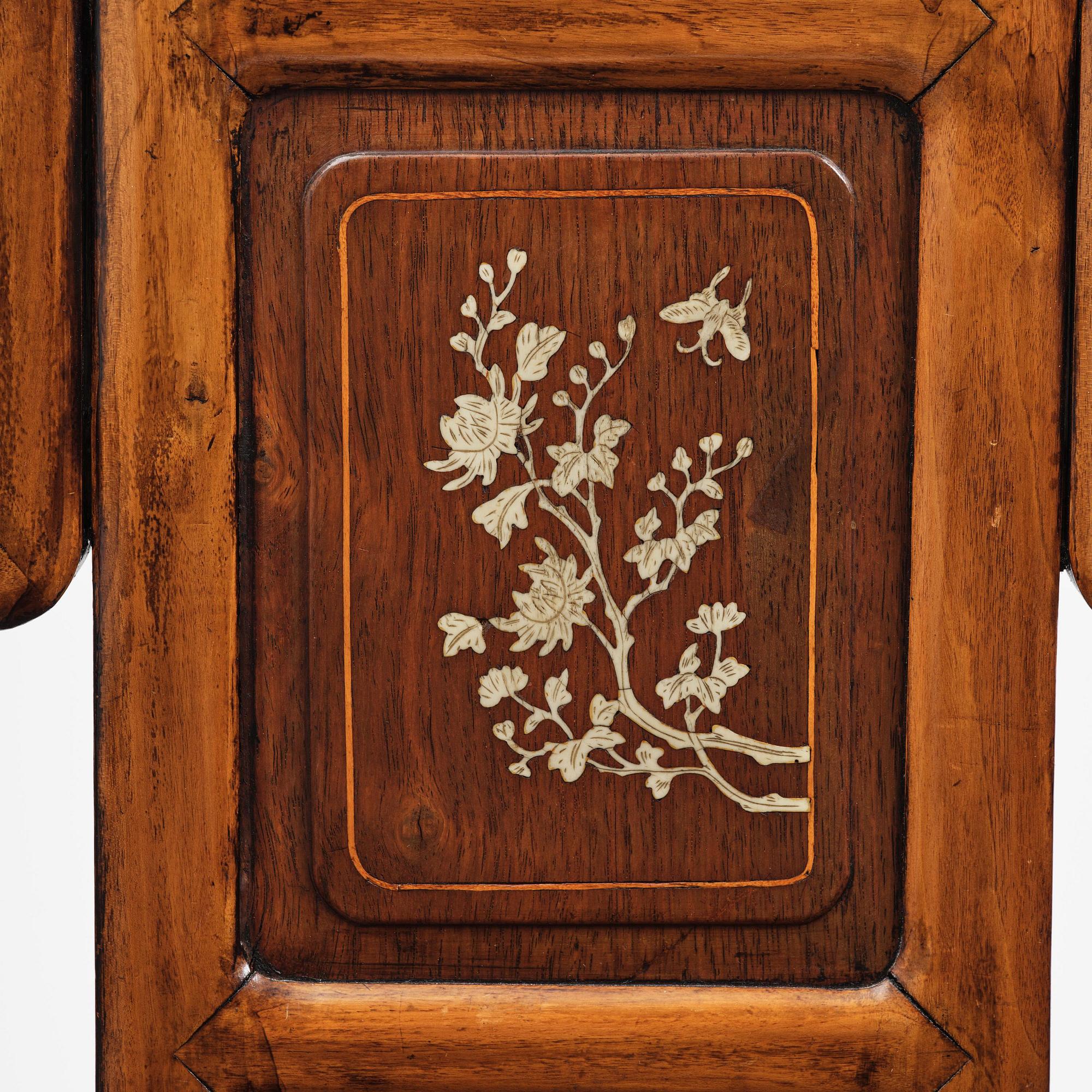 A pair of hardwood armchairs, late Qing dynasty.