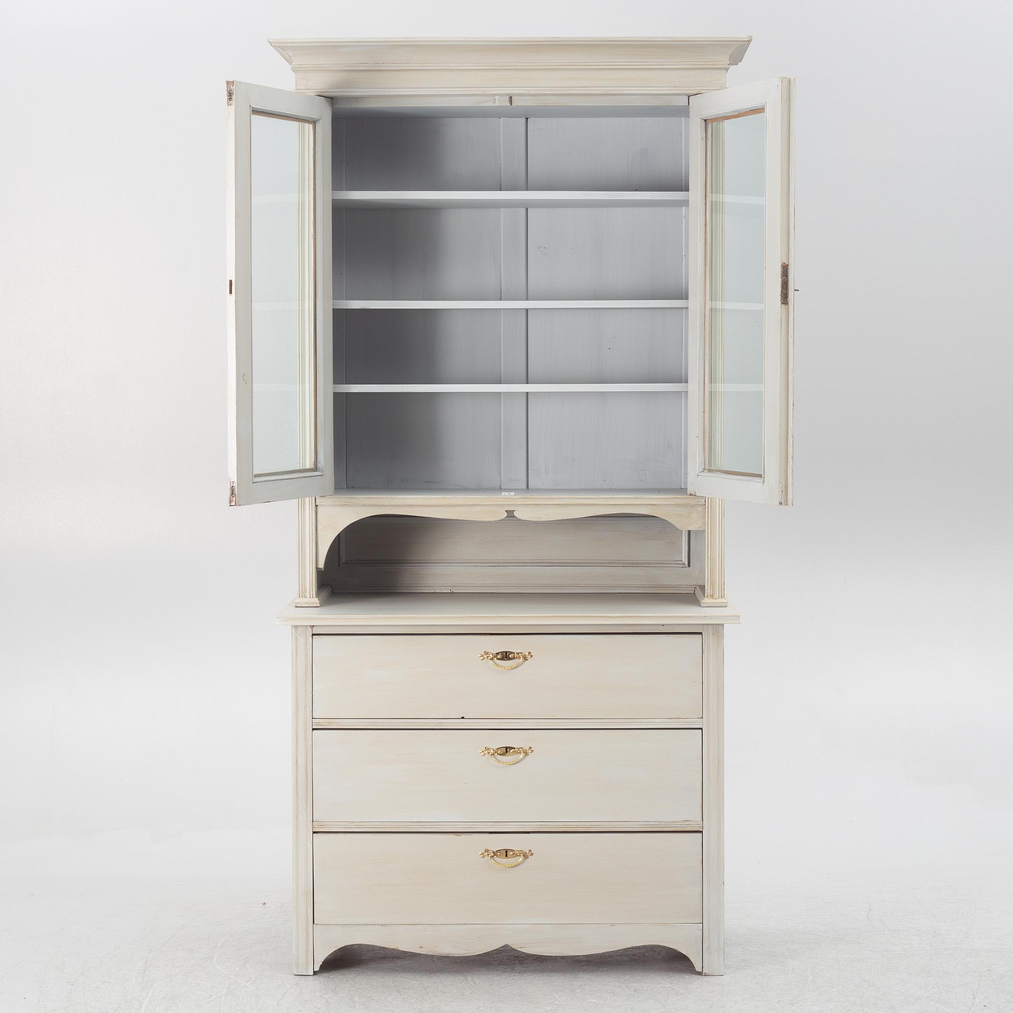 Display cabinet, early 20th century.