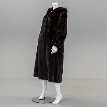 A mink coat by Saga Mink, in size 38/40.