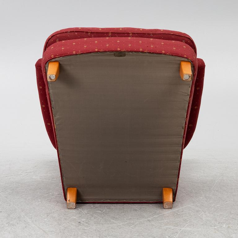 Carl Malmsten, a 'Häggbom' armchair with a 'Jättepaddan' ottoman, AB OH Sjögren, Tranås.