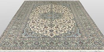 A Keshan carpet, 310 x 206 cm.