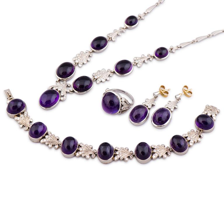 A NECKLACE, BRACELET, EARRINGS and RING, amethysts, diamnonds, 18K white gold and palladium. A. Tillander, 1970s.