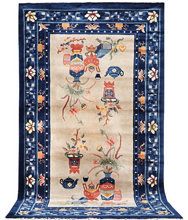 A rug, China, antique finish, ca 206 x 117 cm.