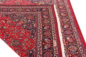 A Najafabad carpet, c. 351 X 305 cm.