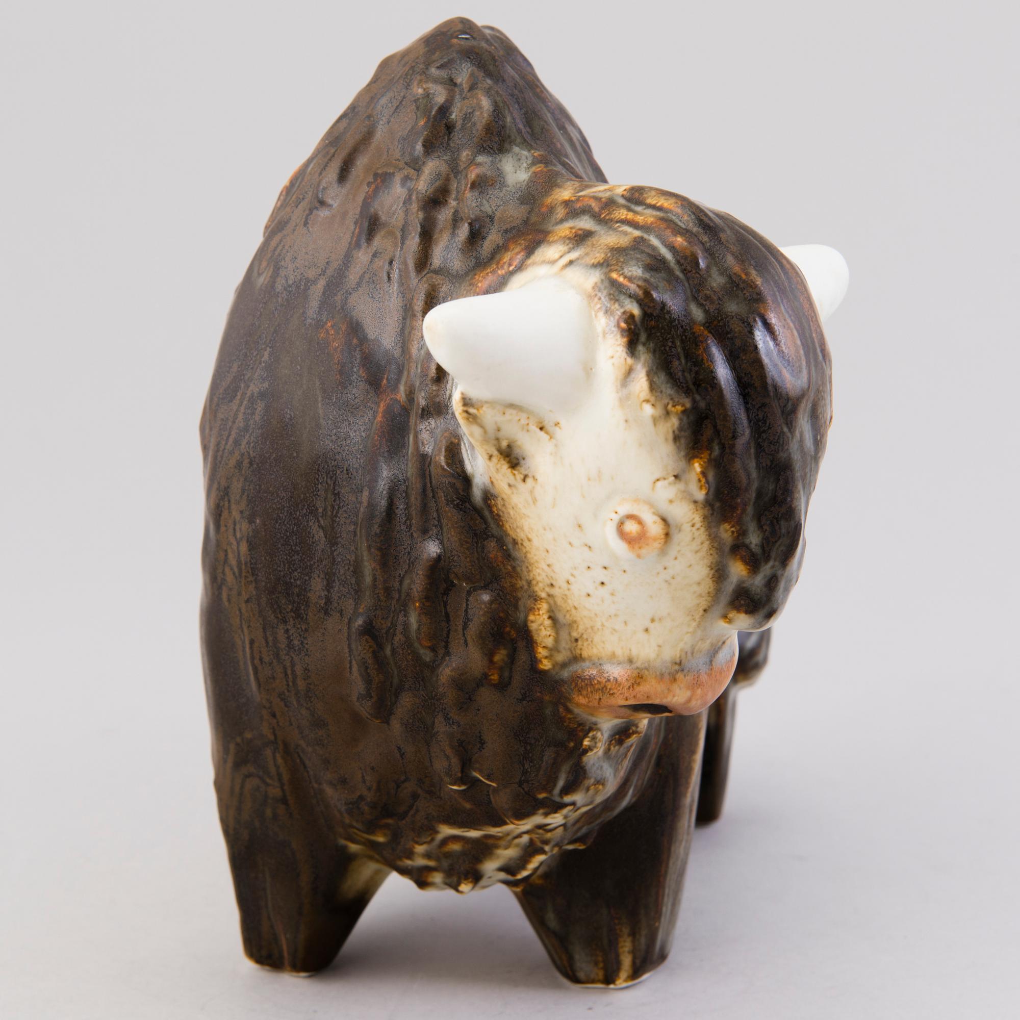 A Ceramic Figurine, signed T Kaasinen Arabia Finland.