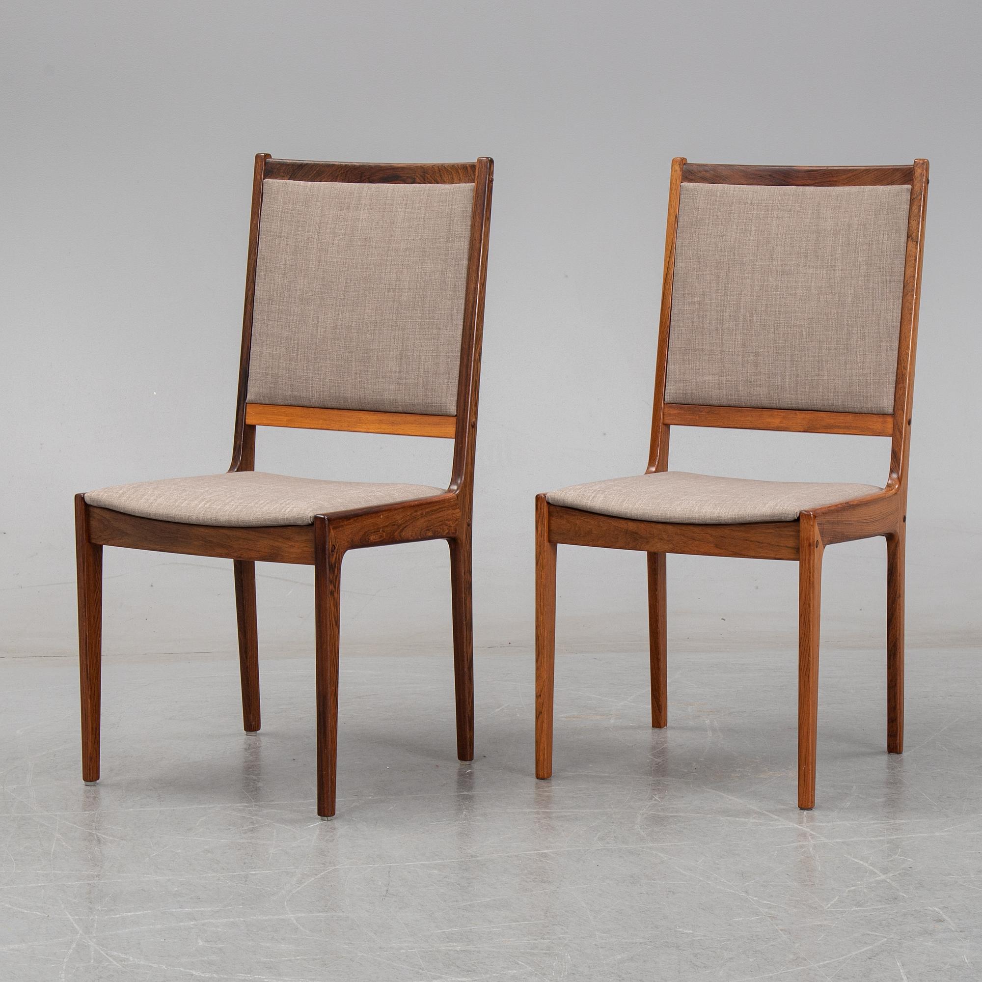 A seven-piece rosewood dining suite, 1960's/70's.