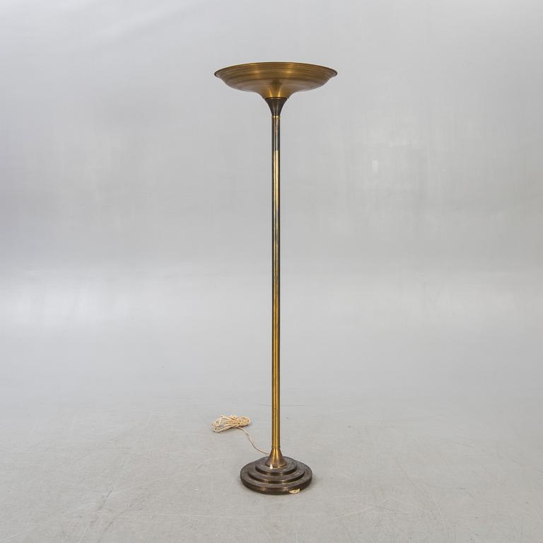 A 1930s Art Deco brass uplight.