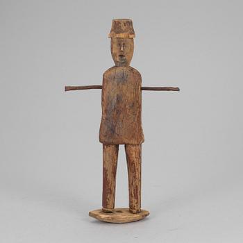 A wooden tool/sculpture, ca 1850.
