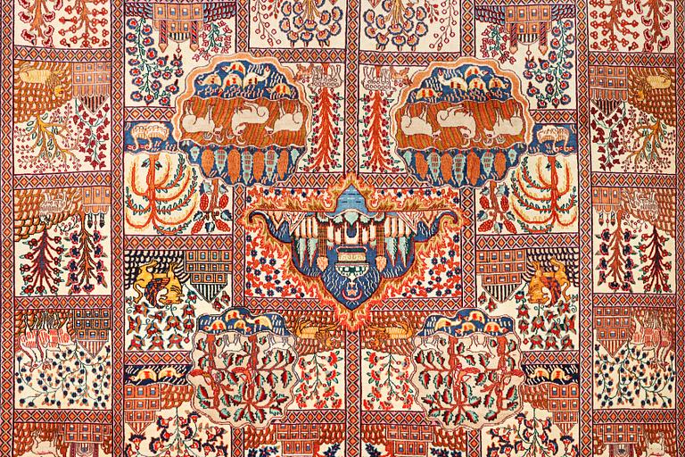 A Kashmar carpet, c. 391 x 291 cm.