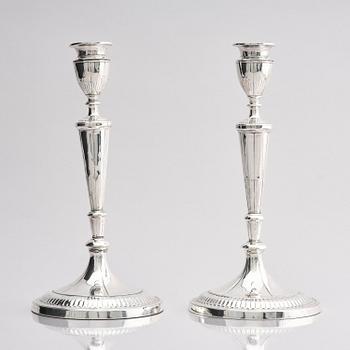 A pair of 18th century silver candlesticks, marks of John Parson & Co, Sheffield 1791.