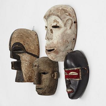 Masker, 4 st, enligt uppgift Dan, Liberia, Ibibio, Nigeria, Varega, Kongo, Songe, Kongo, 1900-talets andra hälft.