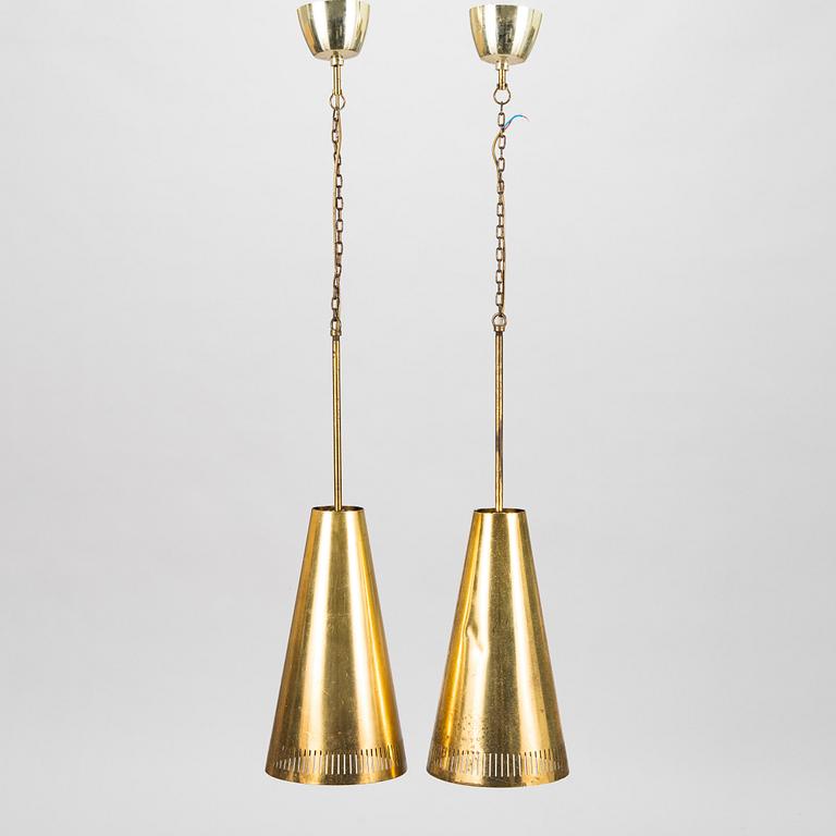 Paavo Tynell, a pair of 1953 pendant lights for Taito.