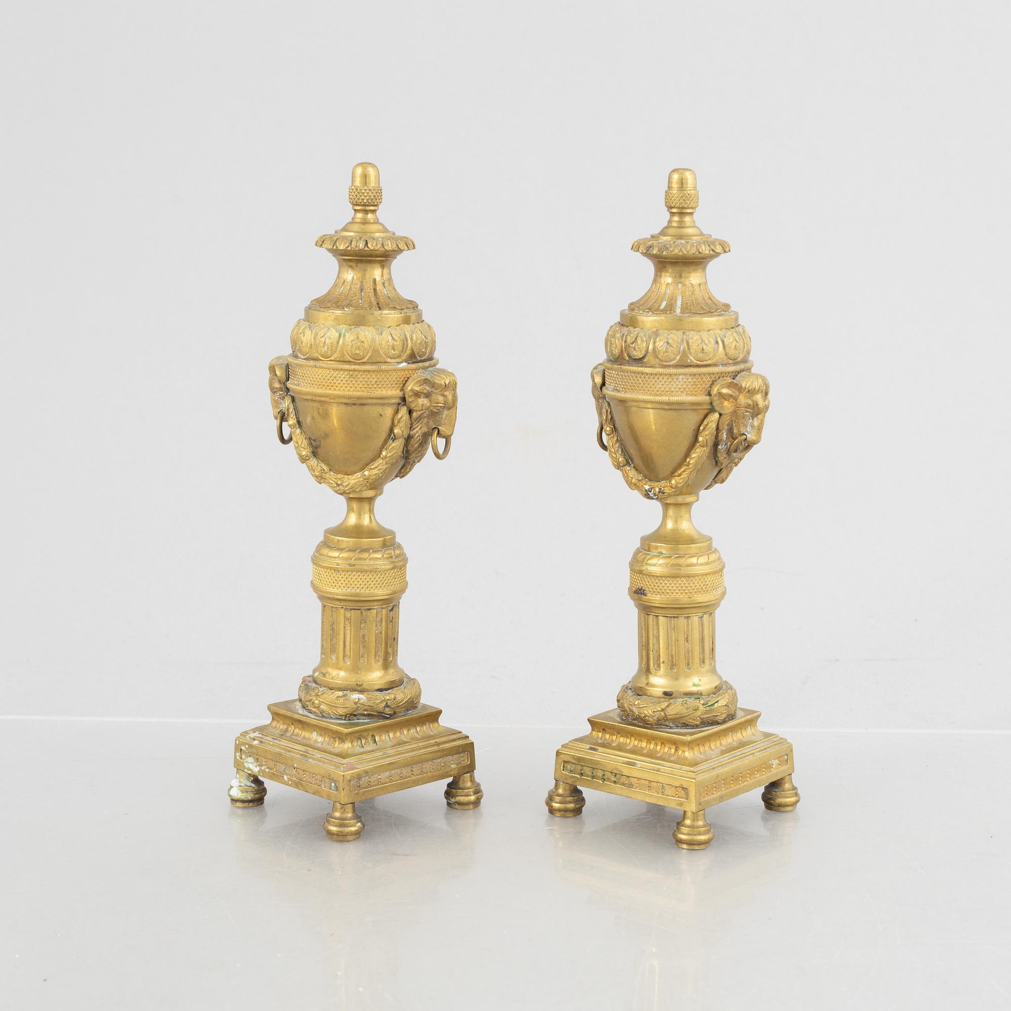 A pair of Louis XVI-style candlesticks, late 19th century.
