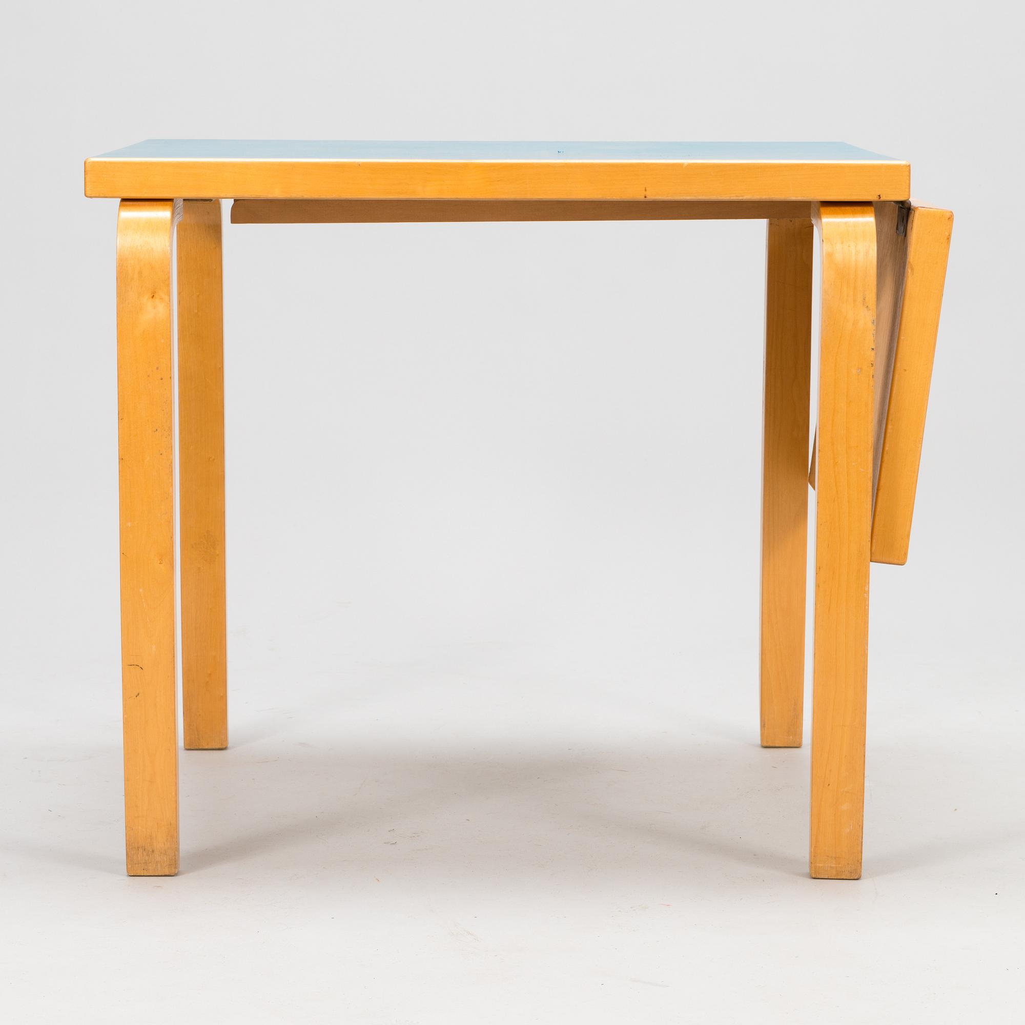 ALVAR AALTO, A mid-20th century drop leaf table for Artek Finland.