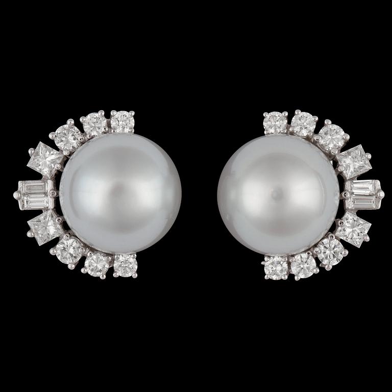 A pair of cultured South sea pearl, 12,5 mm, and diamond earrings.