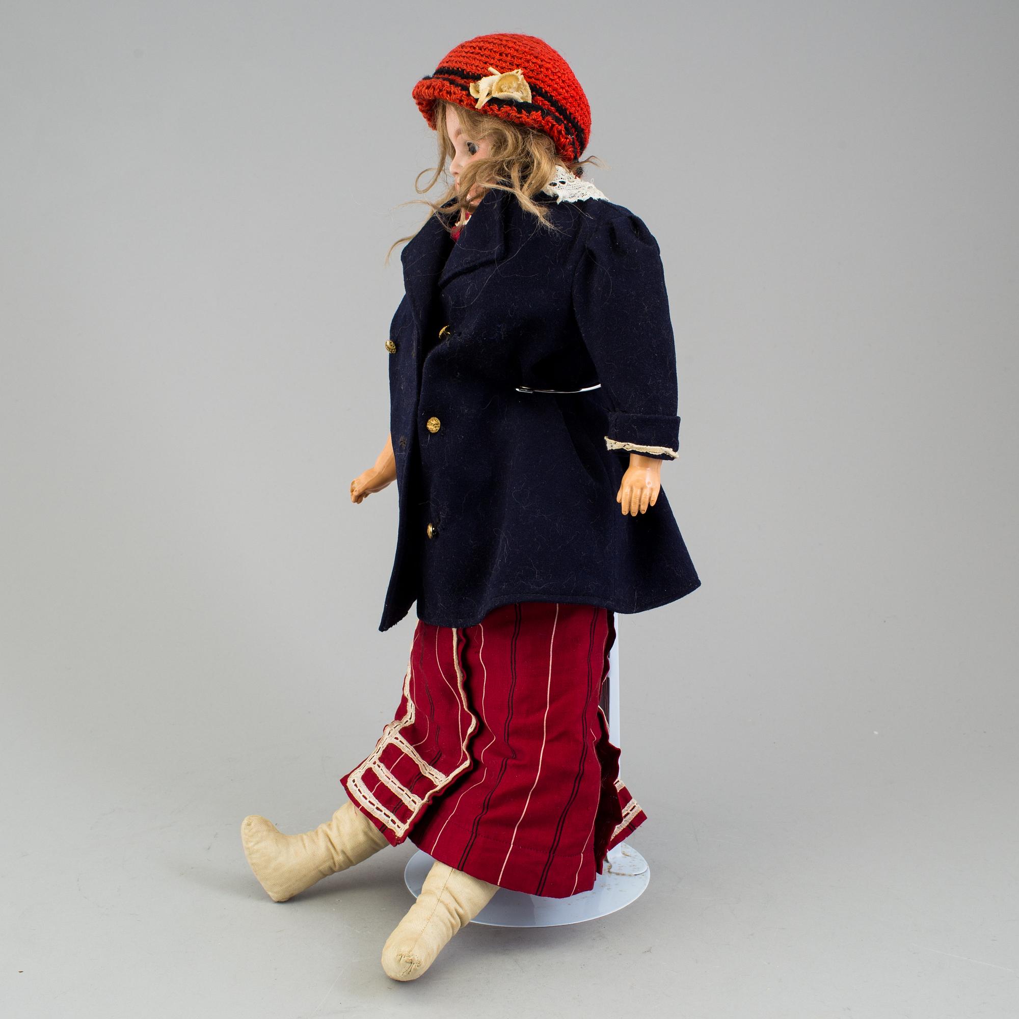 An Armand Marseille 3200 DEP Made in Germany bisque head doll.