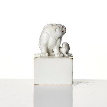 Two seal stamps, soapstone and blanc de chine. Qing dynasty 18th/19th century.