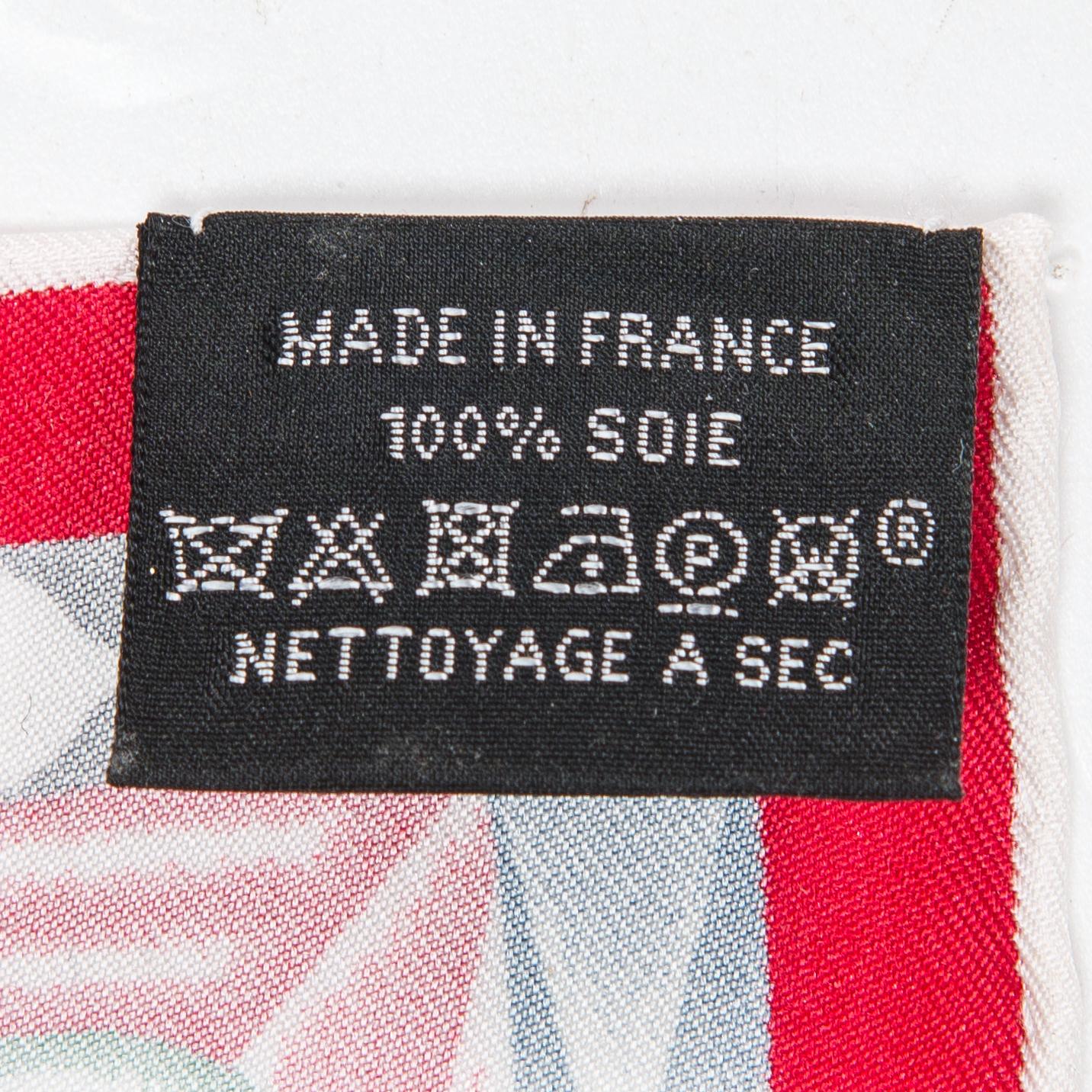 Hermès, 'Robe du soir' scarf and a Hermès scarf ring.