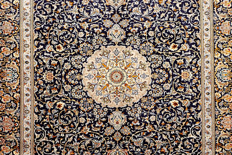 A Kashan carpet, c. 383 x 310 cm.