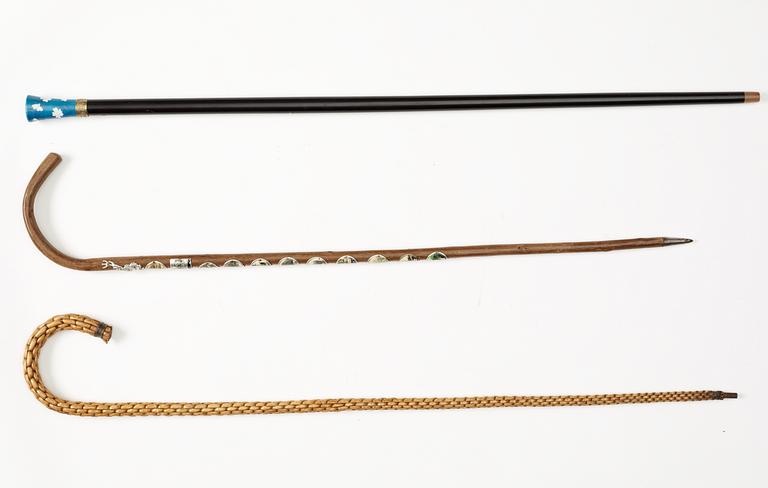Three wooden 20th century sticks.