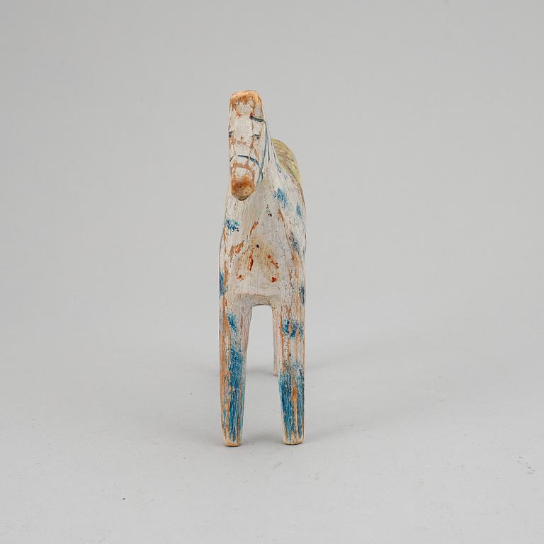 A painted Swedish wooden horse from the early 20th century.