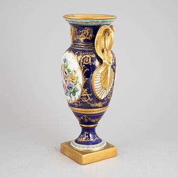 An Empire style porcelain urn decorated by Atelier Le Tallec, France, mid 20th century.