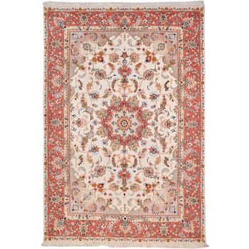 A Kashmar carpet, 295 x 200 cm.