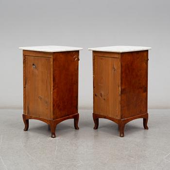 A pair of bedside tables, early 20th century.