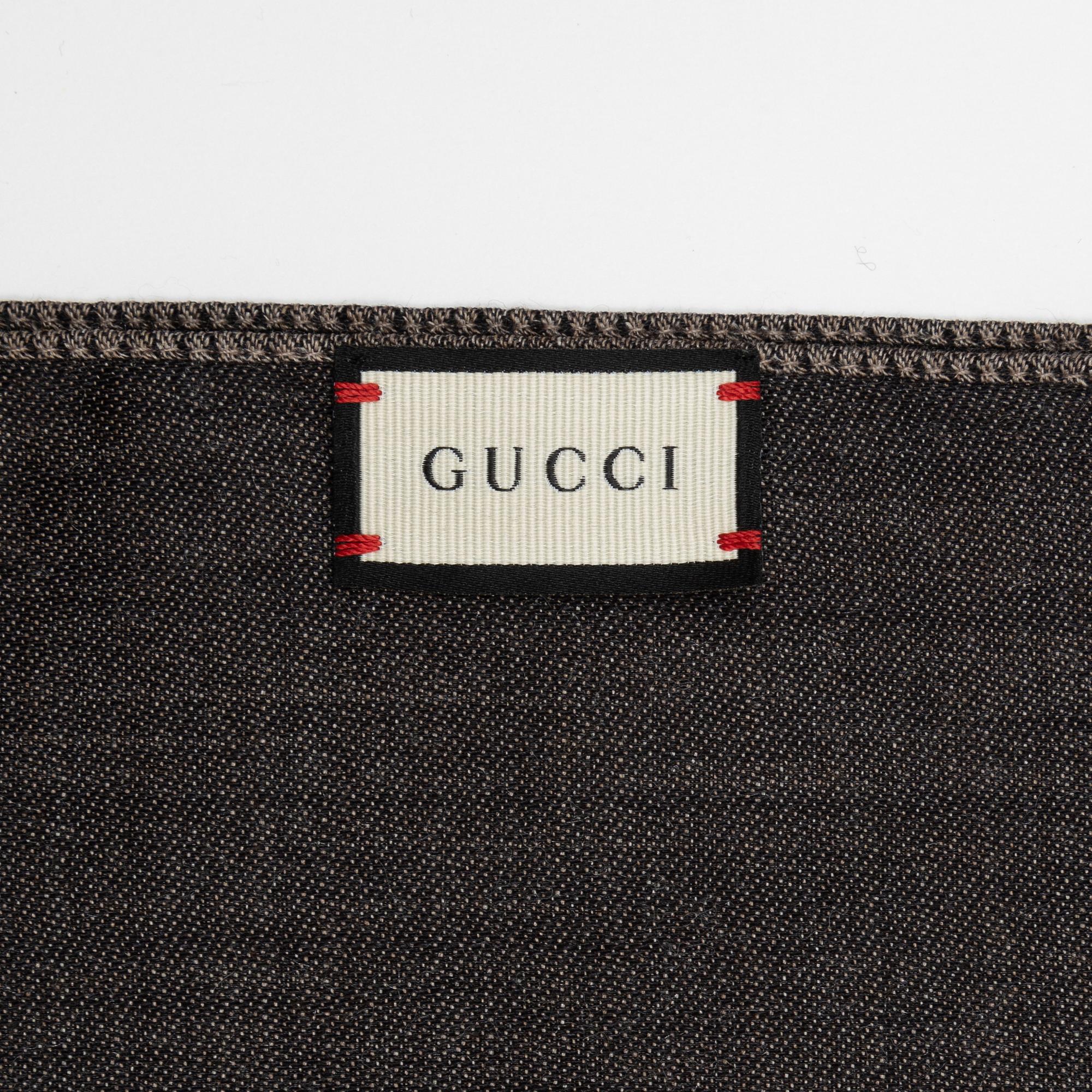 Gucci, a wool and silk mix "GG" jaquard shawl.