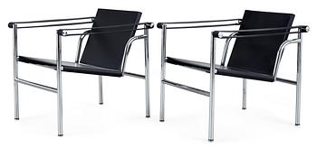 125. A pair of Le Corbusier 'LC 1' black leather  and chromed steel armchairs, Cassina, Italy.