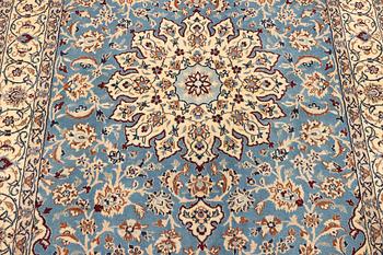 A Nain, part silk carpet, c. 196 x 120 cm.