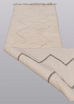 A Moroccan runner carpet, 290 x 70 cm.