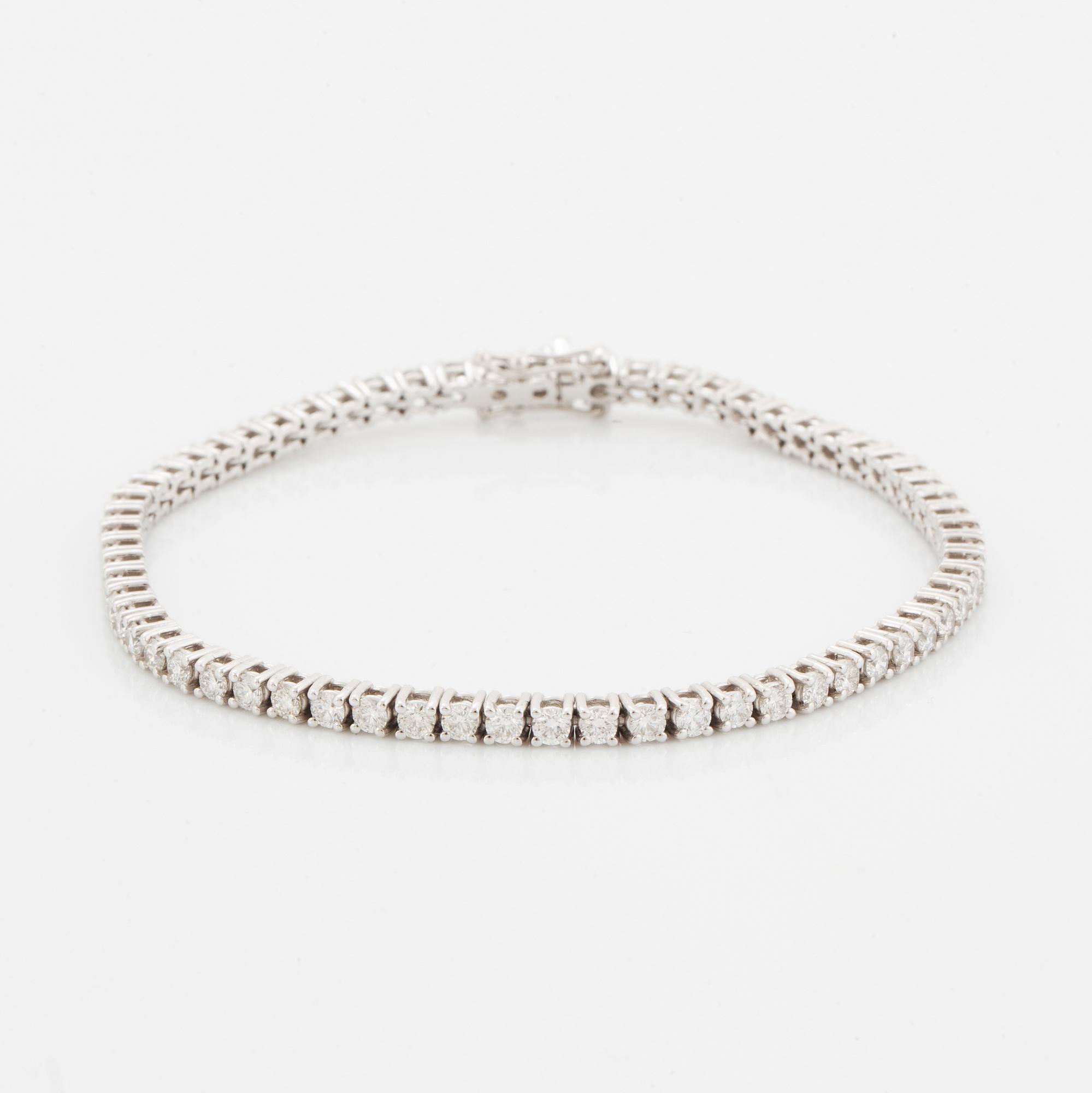 TENNISARMBAND, med briljantslipade diamanter med certifikat HRD.