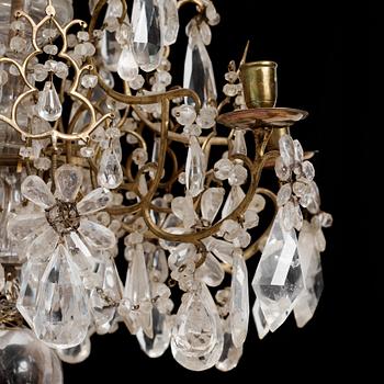 A presumably Italian Baroque and Baroque-style rock crystal and cut-glass six-branch chandelier, 18th century and later.