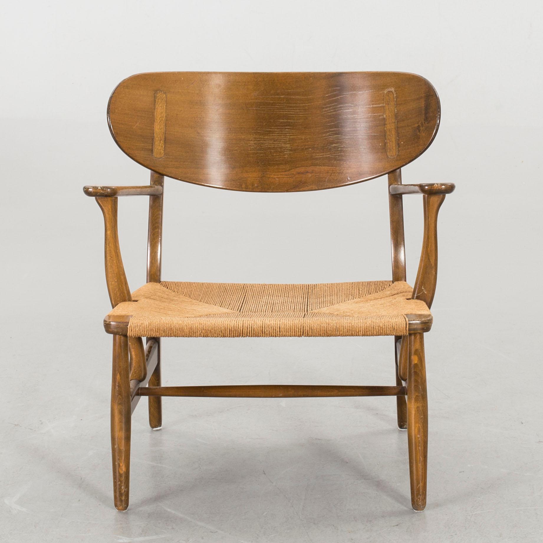 HANS J WEGNER, a "CH-22" armchair, Carl Hansen & Son, Denmark.