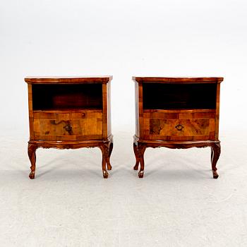 A pair of walnut veneered bedside tables from the second half ot the 20th century.