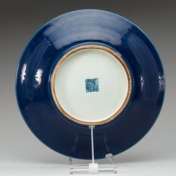 A blue glazed dish, Qing dynasty (1644-1912), with Qianlong seal mark.