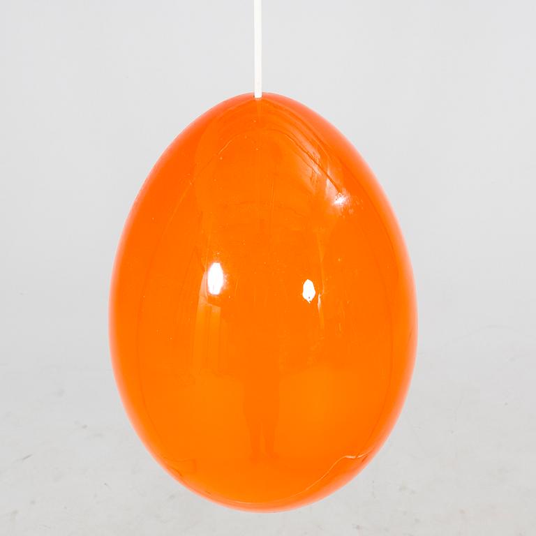 A Luxus 1970s glass ceiling pendant.