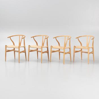 Hans J. Wegner, a set of four model 'CH-24' chairs, Carl Hansen & Søn, Denmark.