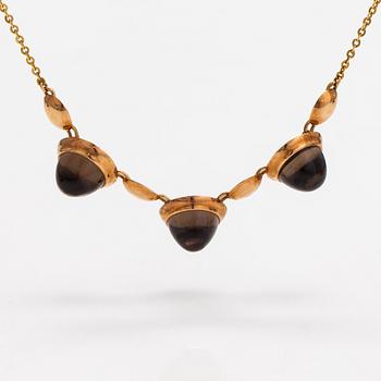 Elis Kauppi, A 14K gold necklace with smoky quartzes. Kupittaan kulta, Turku 1960.