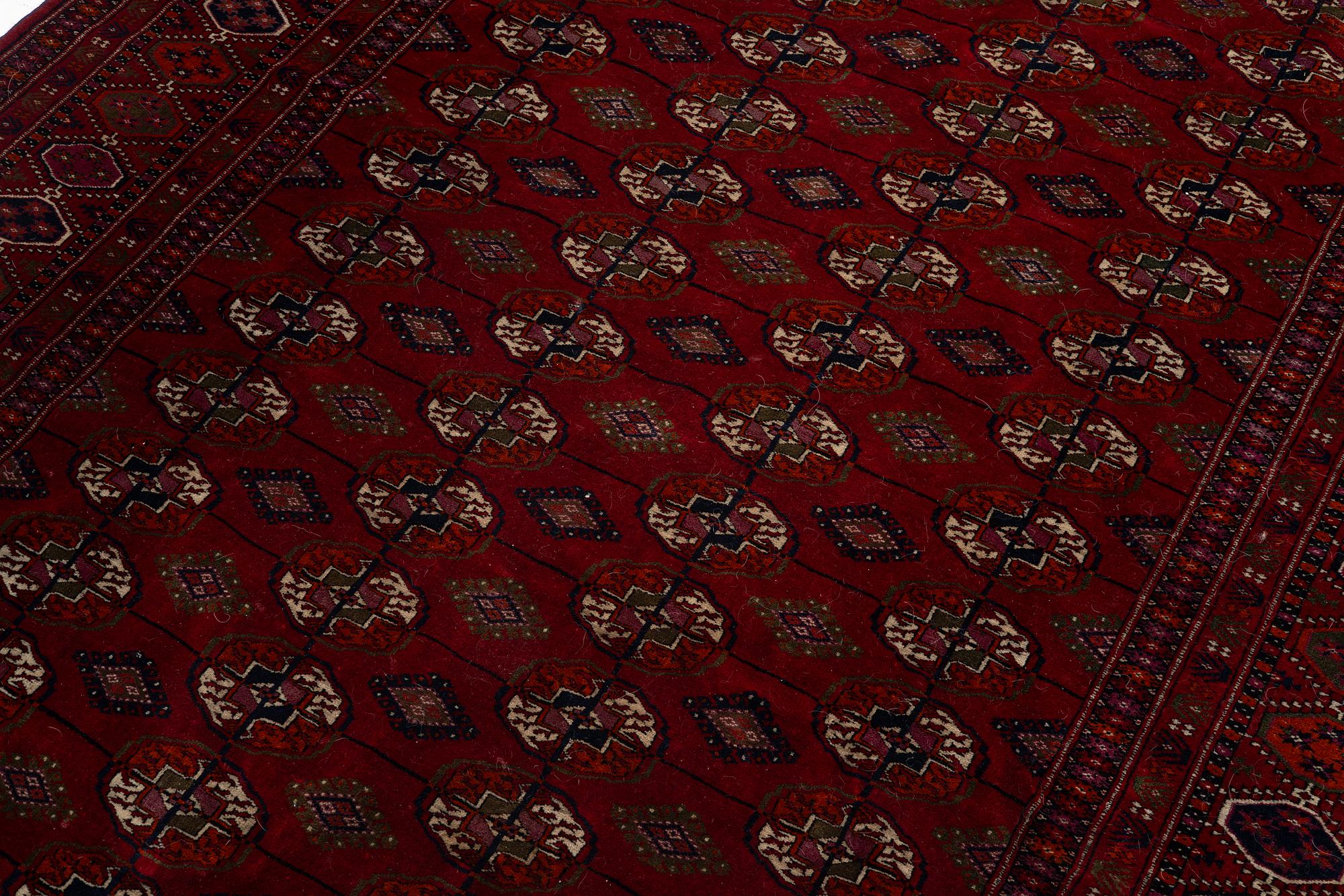 An old Turkmen carpet, c. 235 x 175 cm.