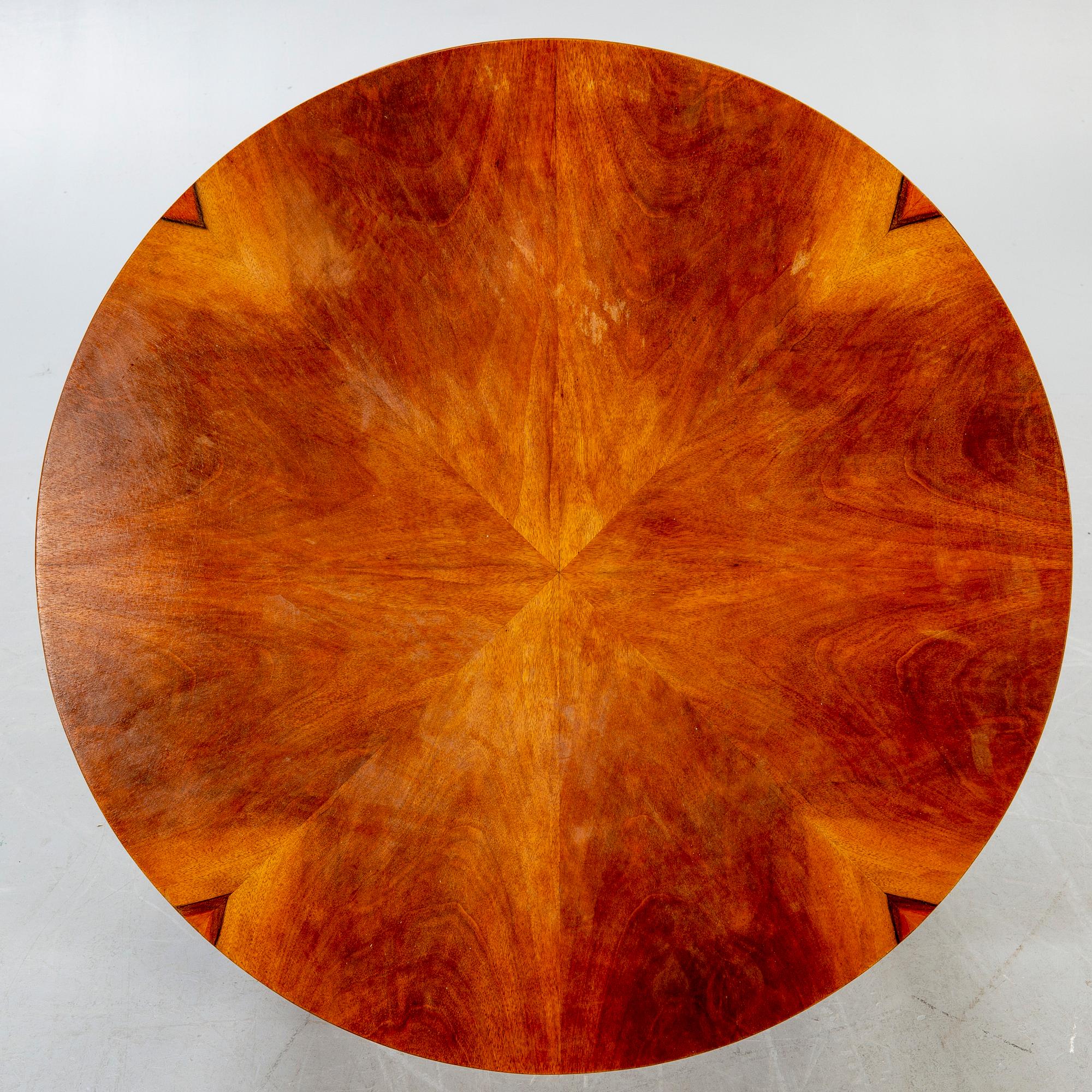 An Art Deco style walnut coffee table later part of the 20th century.