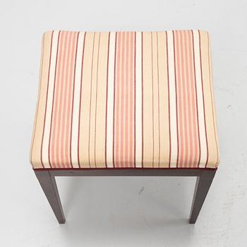 A group of five rosewood veneered chairs and a stool, mid 20th Century.