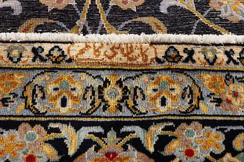 A Kashan carpet, c. 363 x 247 cm.