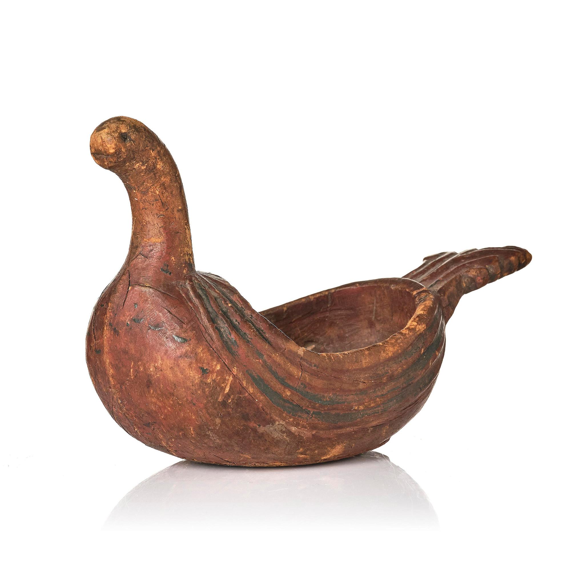 A Swedish carved and painted figural drinking vessel from Jämtland or Härjedalen, late 18th / early 19th century.