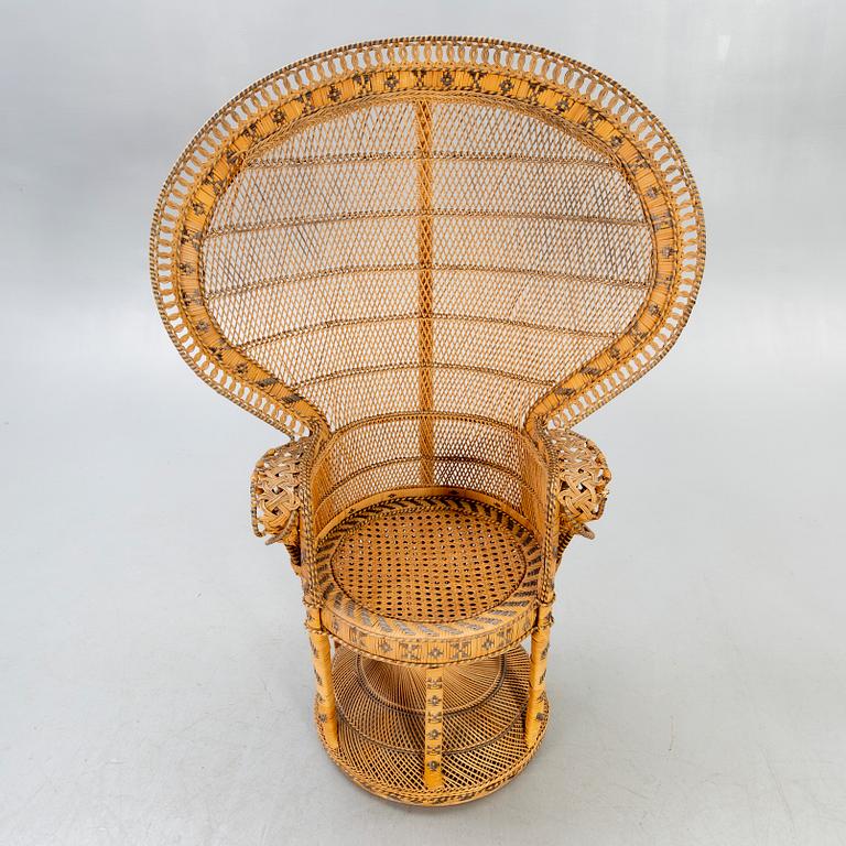 A mid 1900s wicker chair.