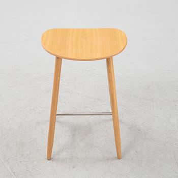 An oak 'Icha Bar Stool, by Chris Martin for Massproductions.